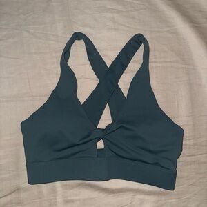 Fabletics Oasis Twist Medium Impact Sports Bra in Storm Slate
